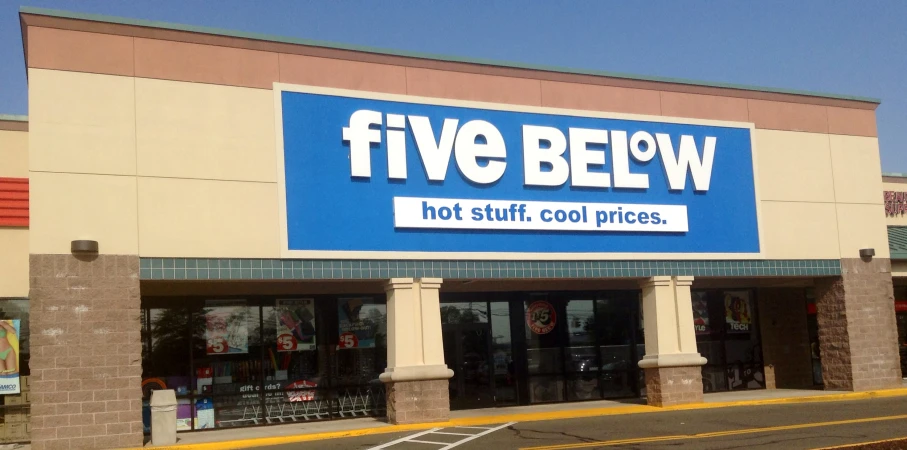 there is a shop front with the word five below it