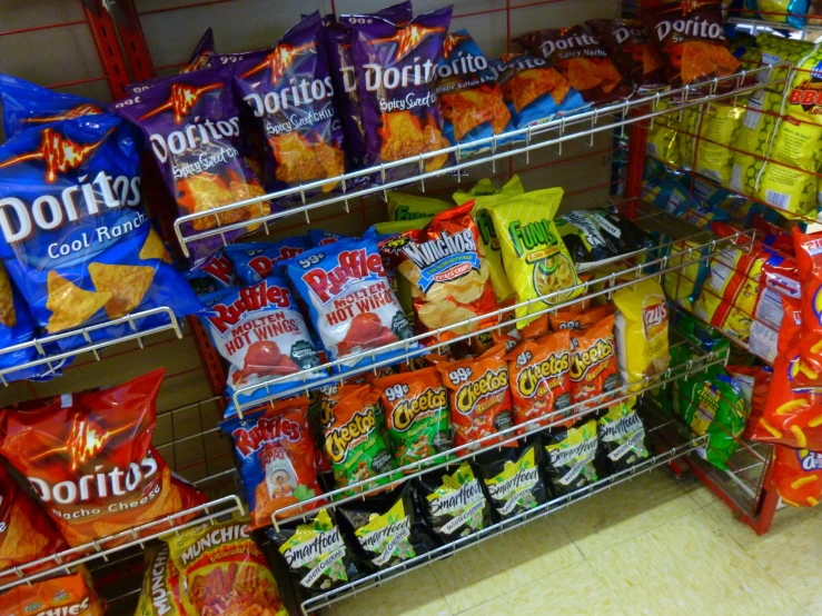 an aisle filled with food on display in a store
