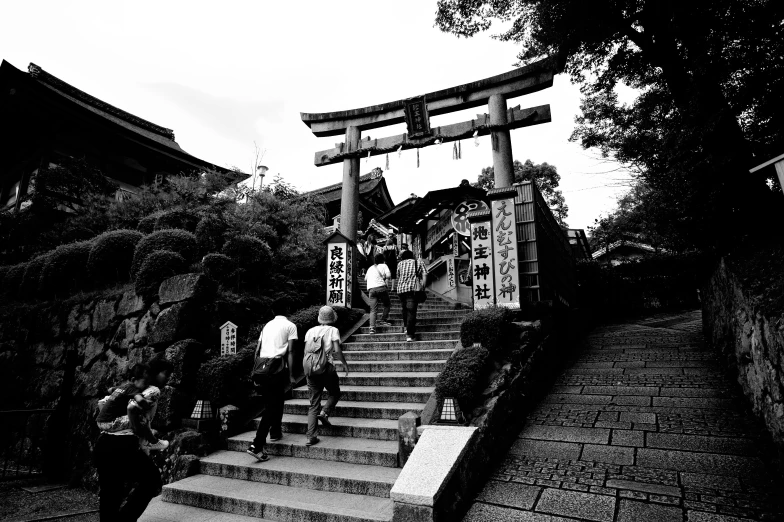 people walking up and down steps in a line