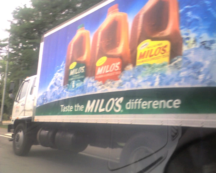 a close up of a truck on the road