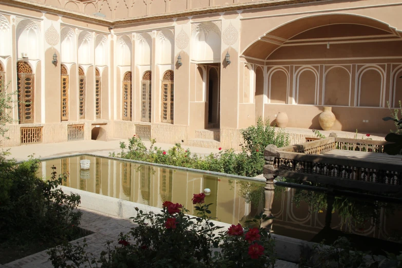 this is an outdoor building with a pond