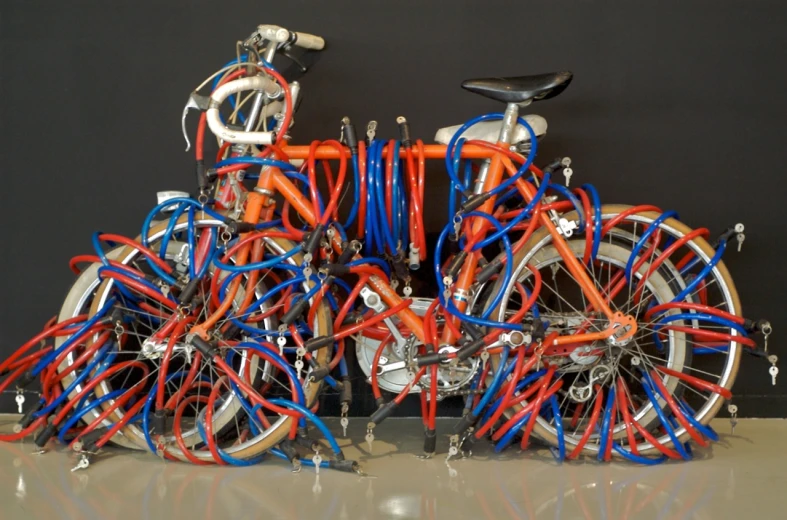 many different types of bikes, each with different colored bars
