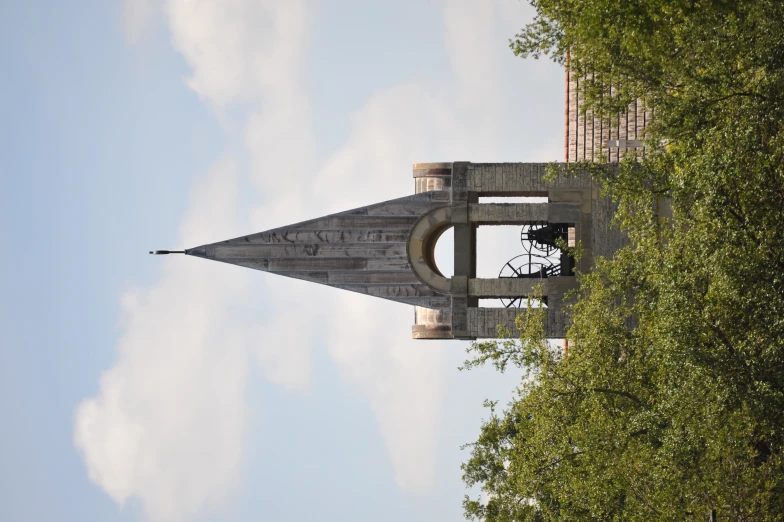 a tall clock tower with a clock on it's face