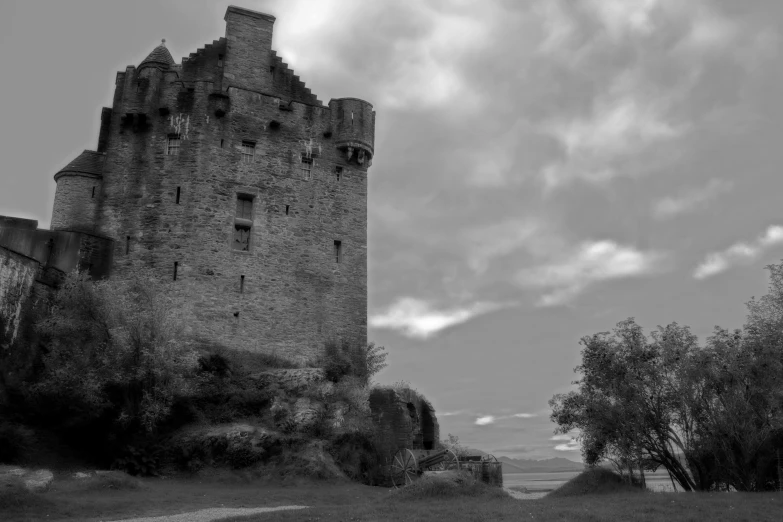 an old castle standing alone in the middle of nowhere