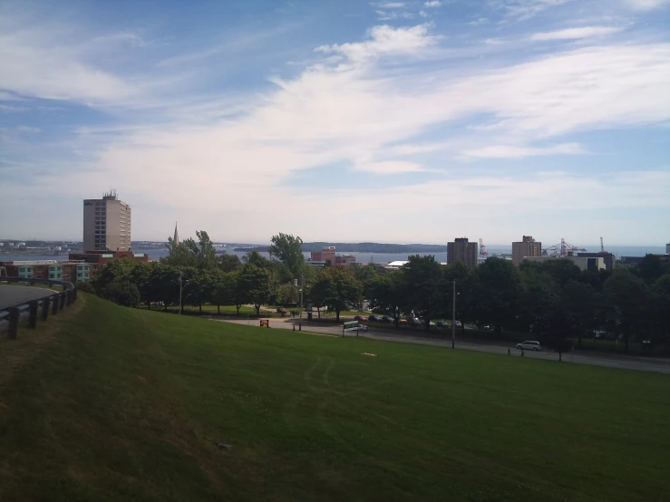 there is a bench sitting on the side of a hill