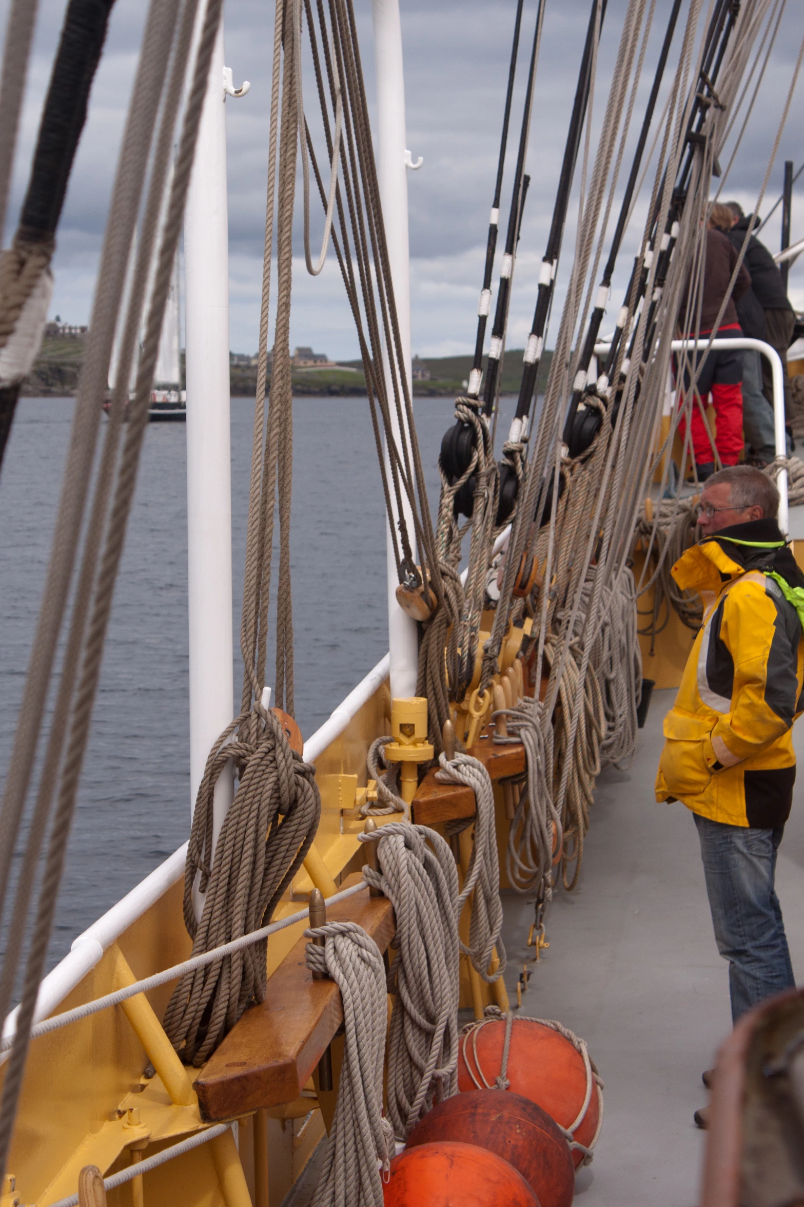 men on the deck of an old sailing vessel