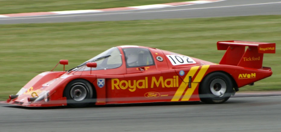 a car is driving around the track at an event