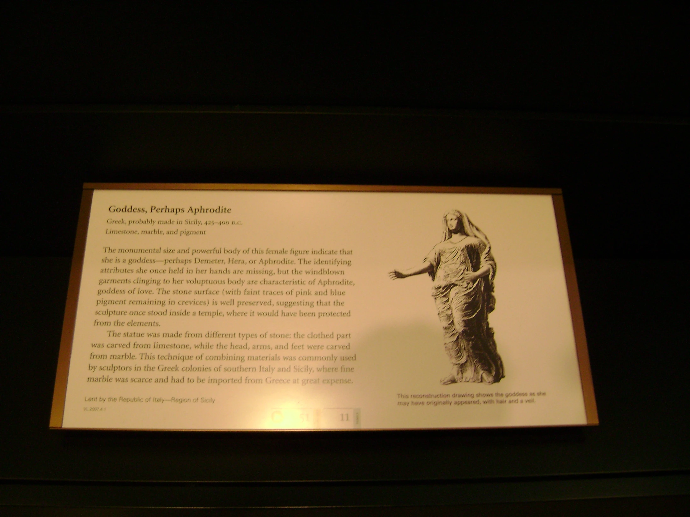 a person standing on a plaque in the dark