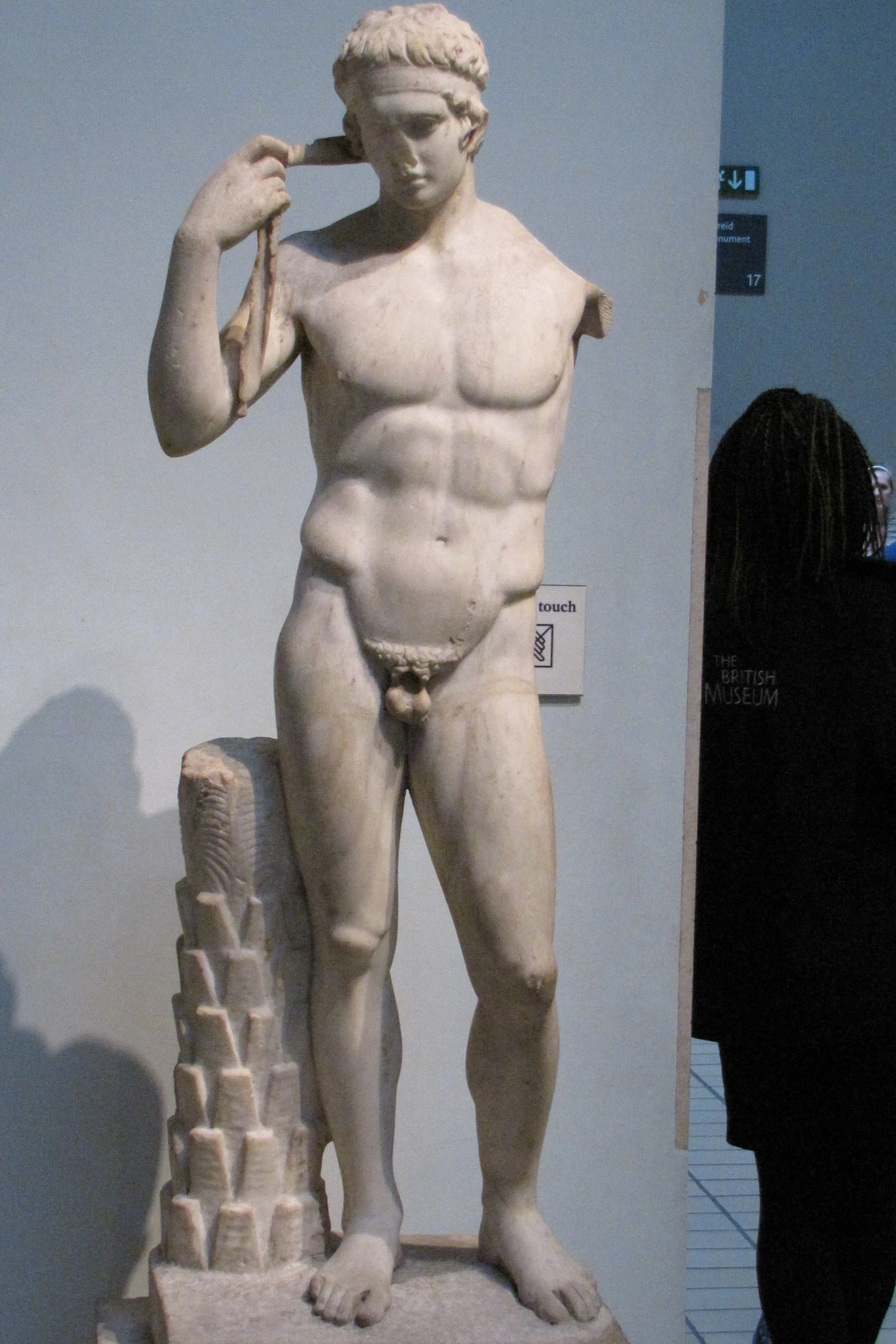 a statue of an oben standing on the ground