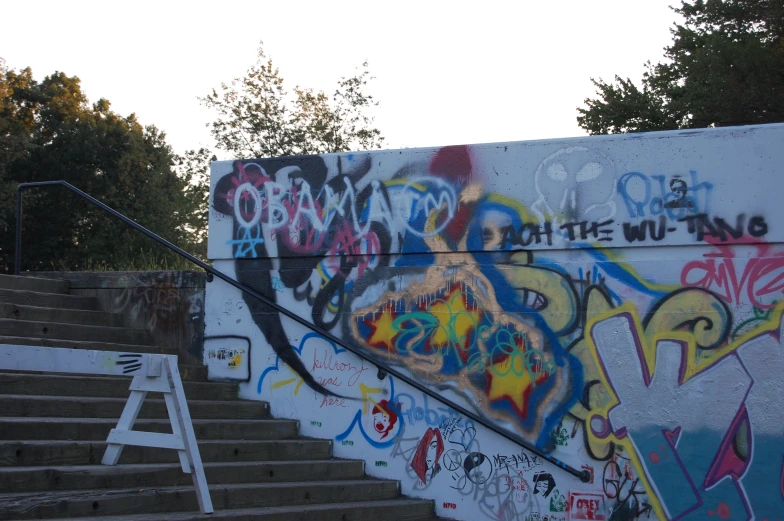 the staircase has been graffiti covered with various spray paint