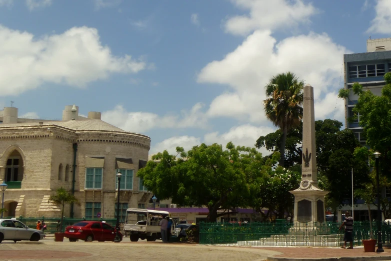 a building with a tall clock in front