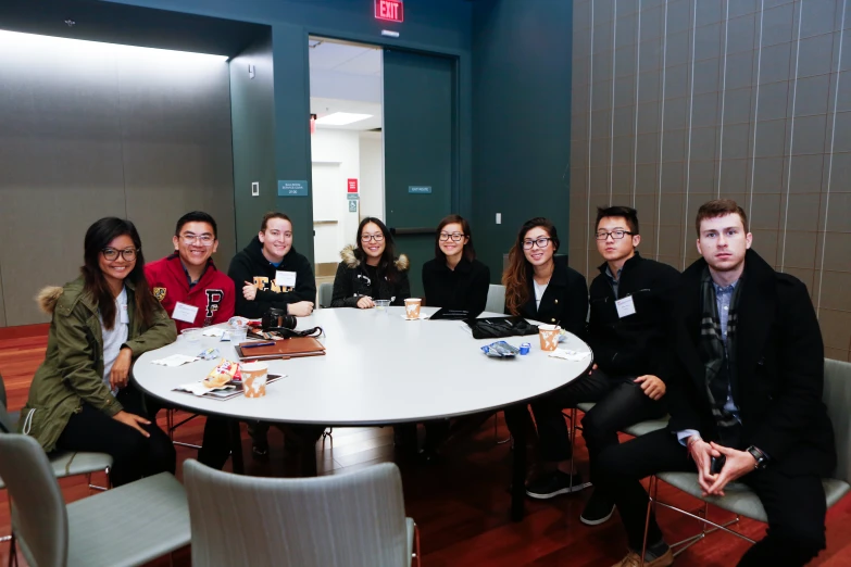 a group of people at a table eating food