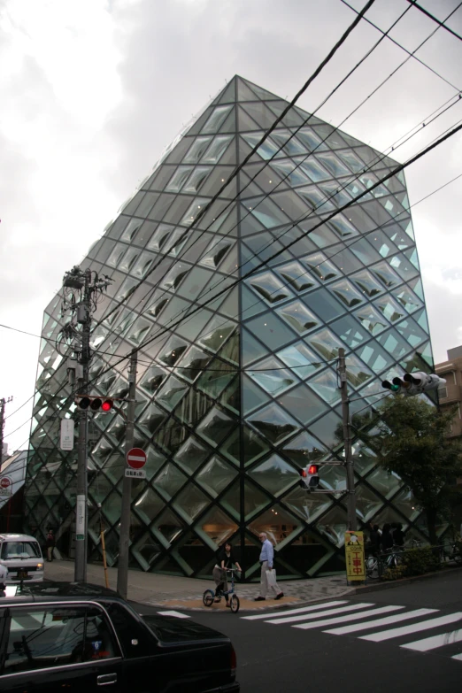 a large building with some glass front and sides