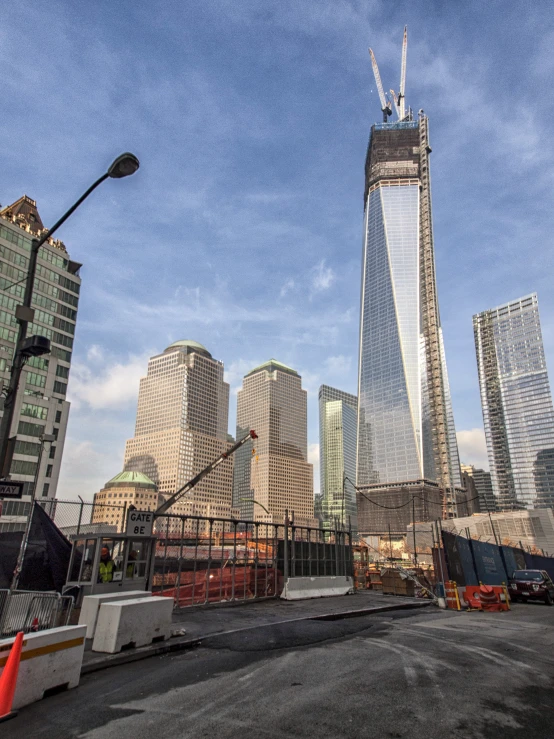 the view of skyscrs under construction with a bright blue sky