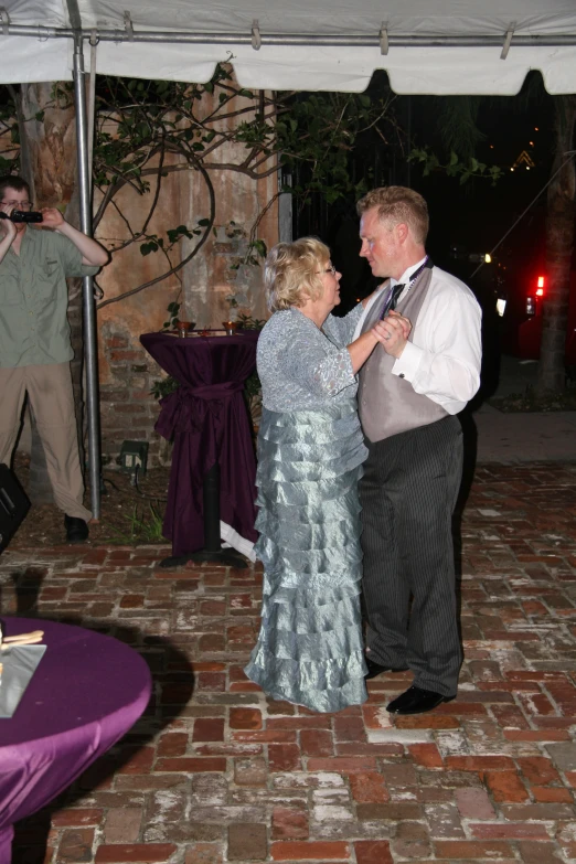 a couple dancing at their wedding