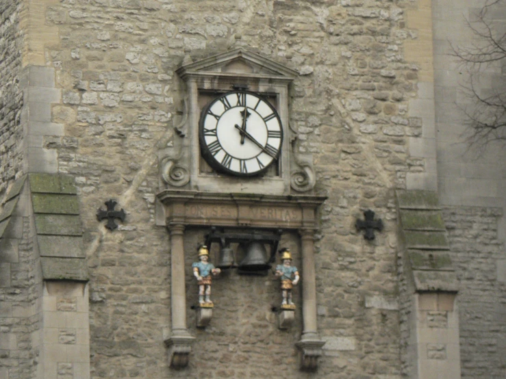 a clock tower on a large stone building