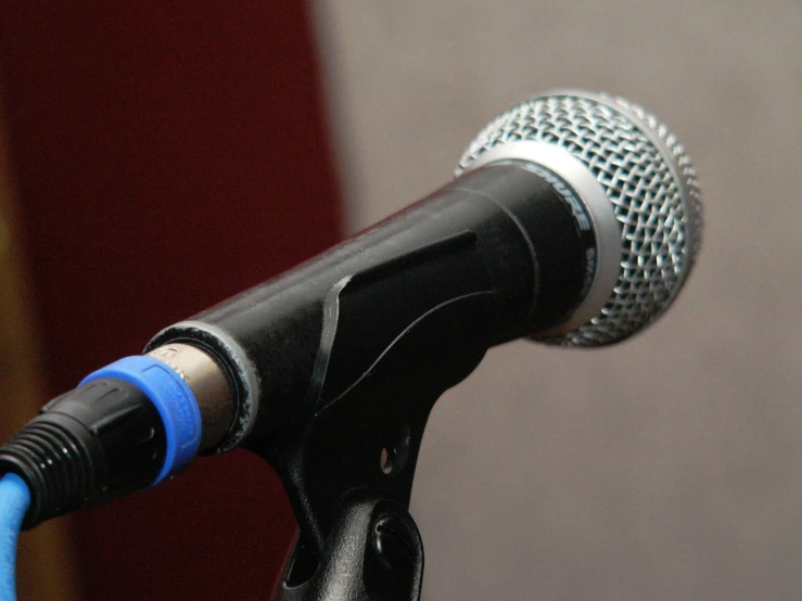 a microphone is shown with a cord attached to it