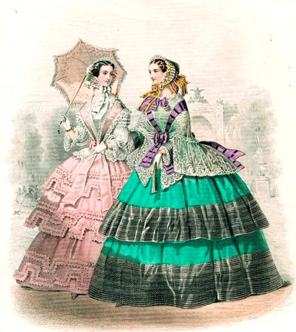 two women in dresses from the 1800s or early 1900
