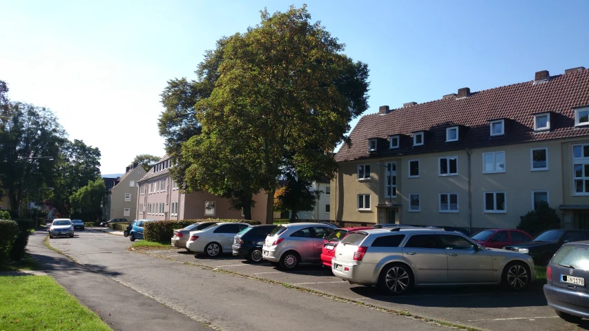 an image of a group of parked cars in the street