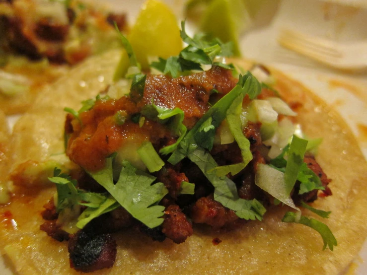 a plate filled with a taco and salad