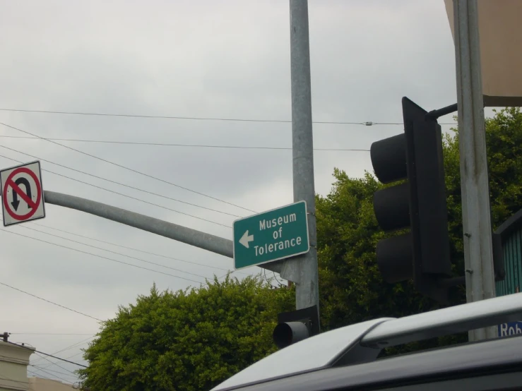 there is a street sign on the corner
