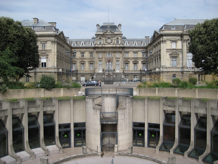 an old building with columns around the outside