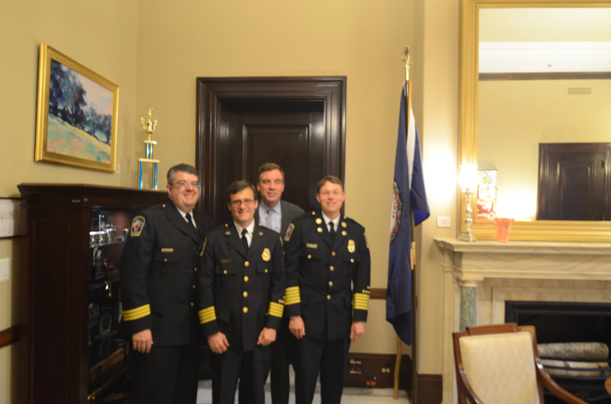 six navy officers are posing for a po in front of an american flag