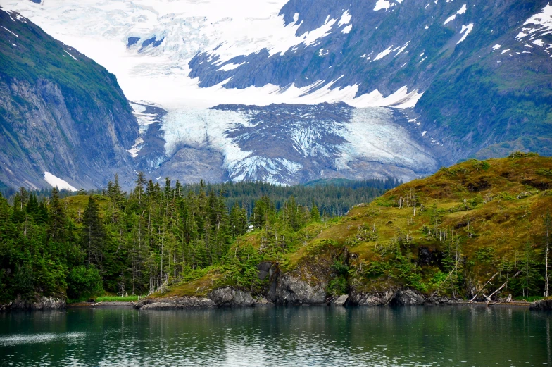 a landscape that has many snow on top of the mountains