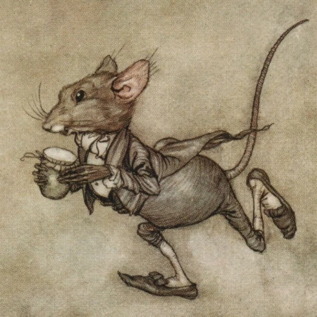 a mouse wearing a suit holding an animal in its hand