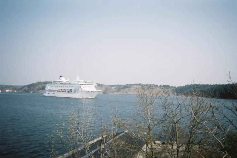 a large cruise ship sitting on top of a river