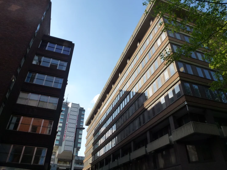 a city street in front of some tall buildings