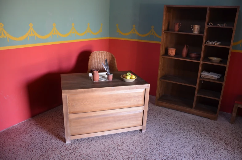 an empty room with painted walls and furniture