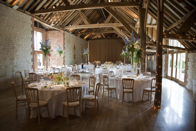 a wedding reception in a rustic venue