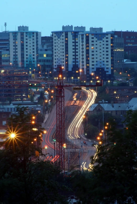 street lights and signs along buildings lit up