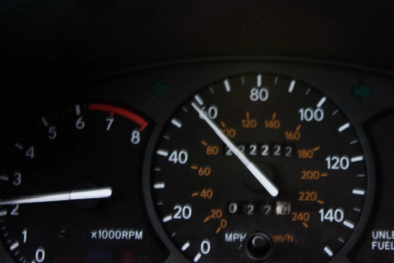 the dashboard of a car with different gauges