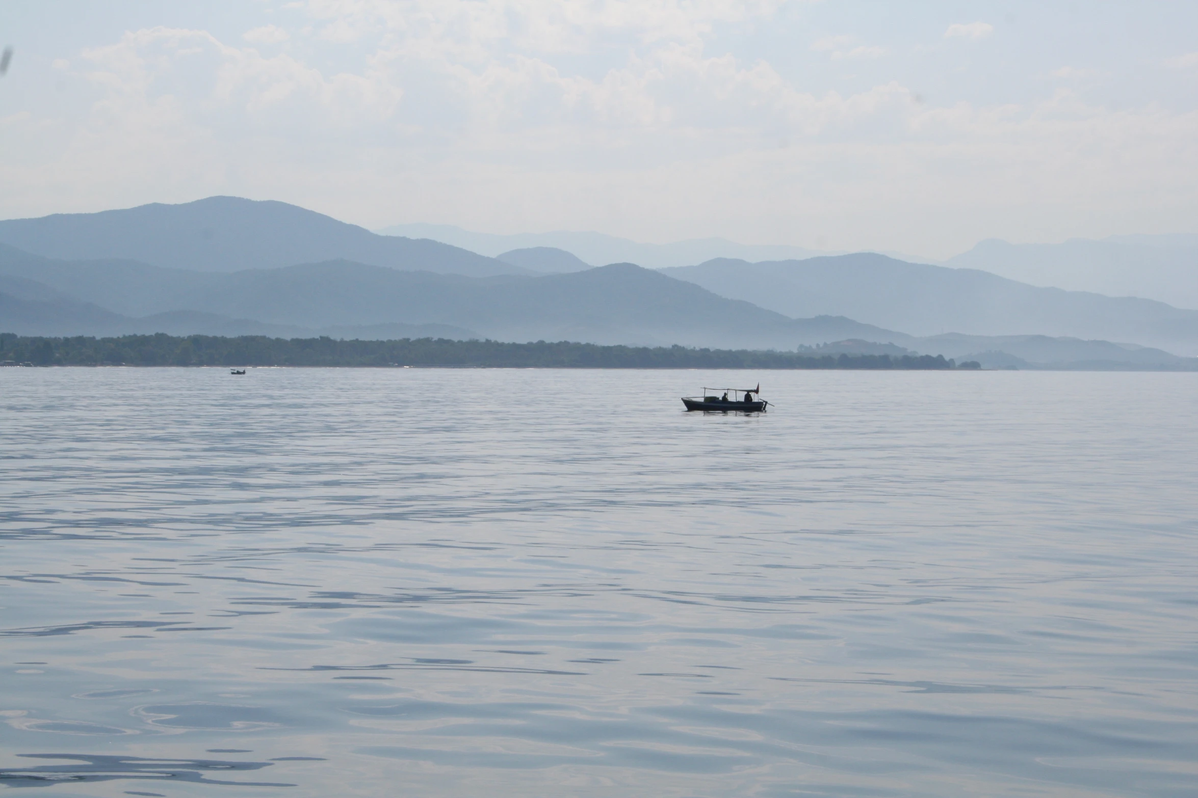 a man is out on the water in his boat