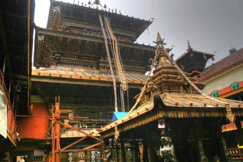 the temple has ornate, wooden structures in it