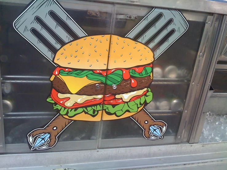 a huge window with a cut out po of a hamburger