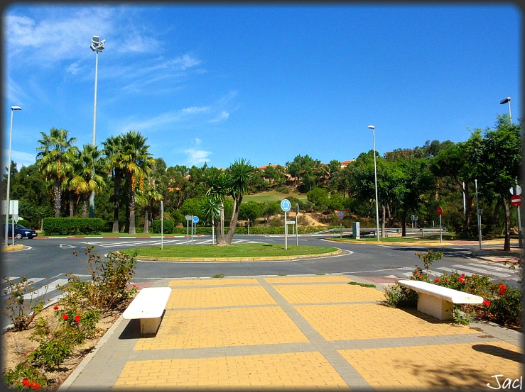 a empty concrete walkway at a park