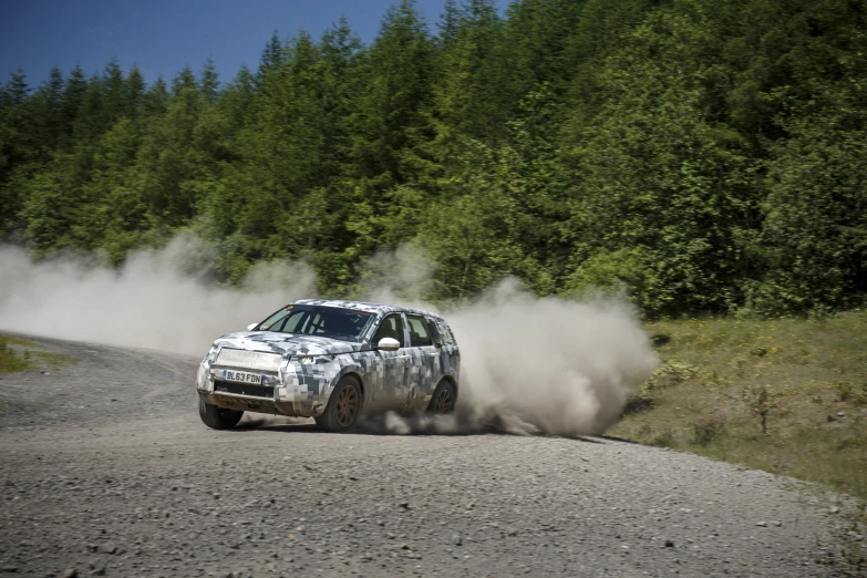 an off road car going through the trees