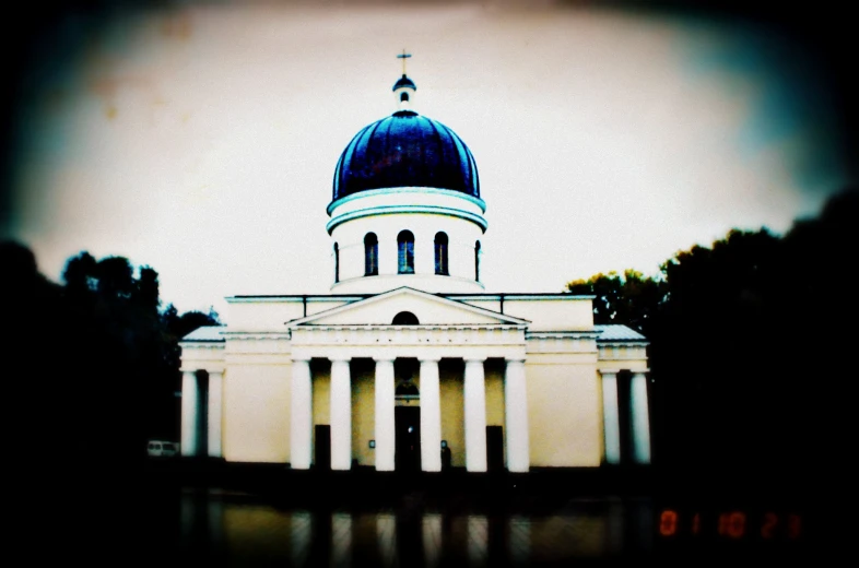 the building with a dome is shown on top