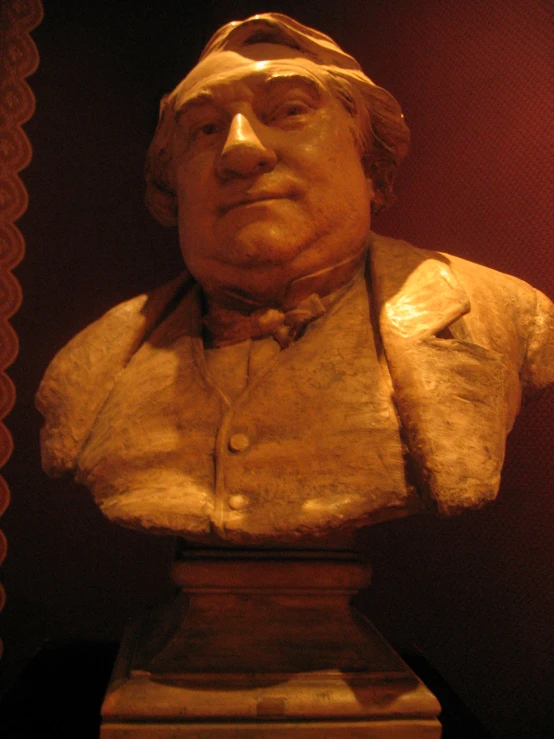 a statue of a man wearing a bandaged headband
