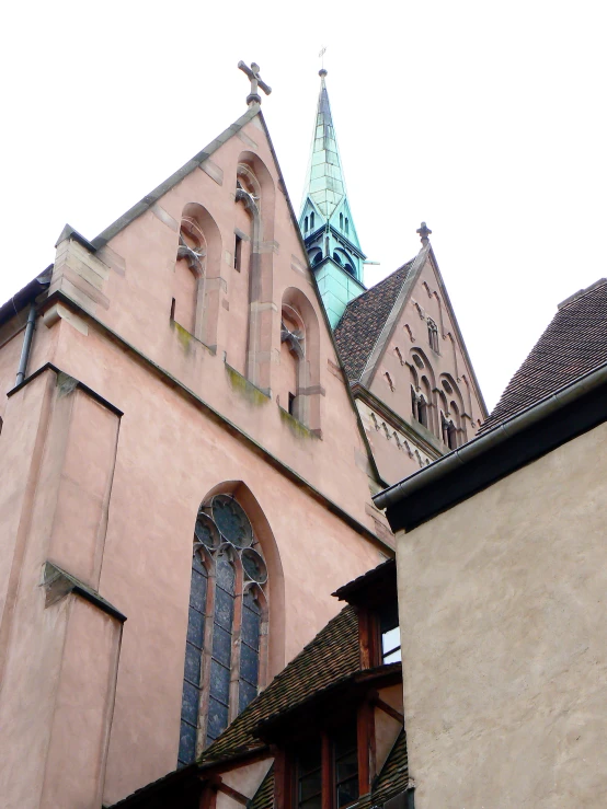 some very pretty looking old buildings with spires