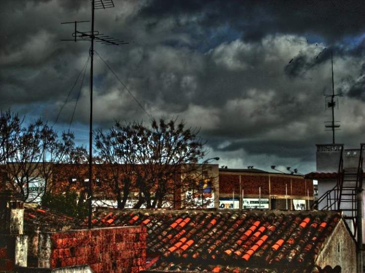 a pograph of a rooftop with red bricks