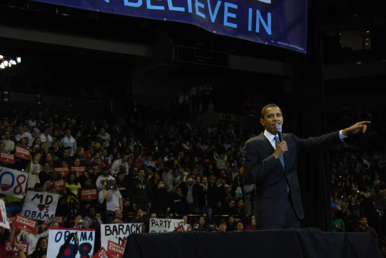 obama addresses supporters in front of a crowded audience