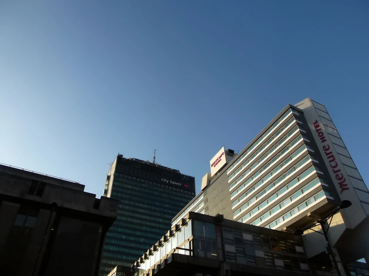 some buildings that are standing next to each other