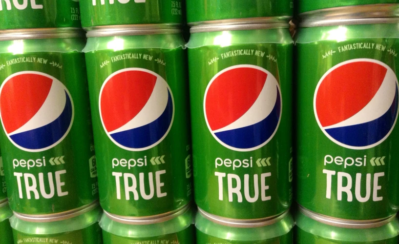 several cans of pepsi true in a supermarket