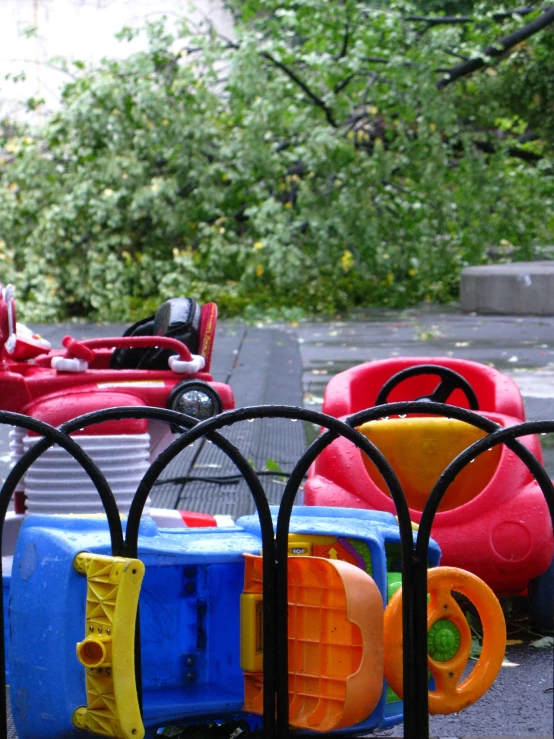 colorful toy cars with water wheels attached to them