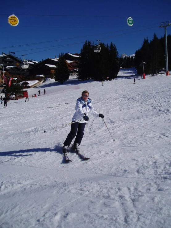 the snow skier is getting ready to go down the hill