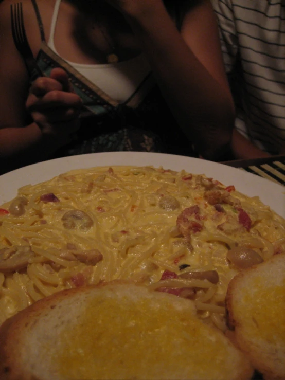 a plate with some bread in front of it